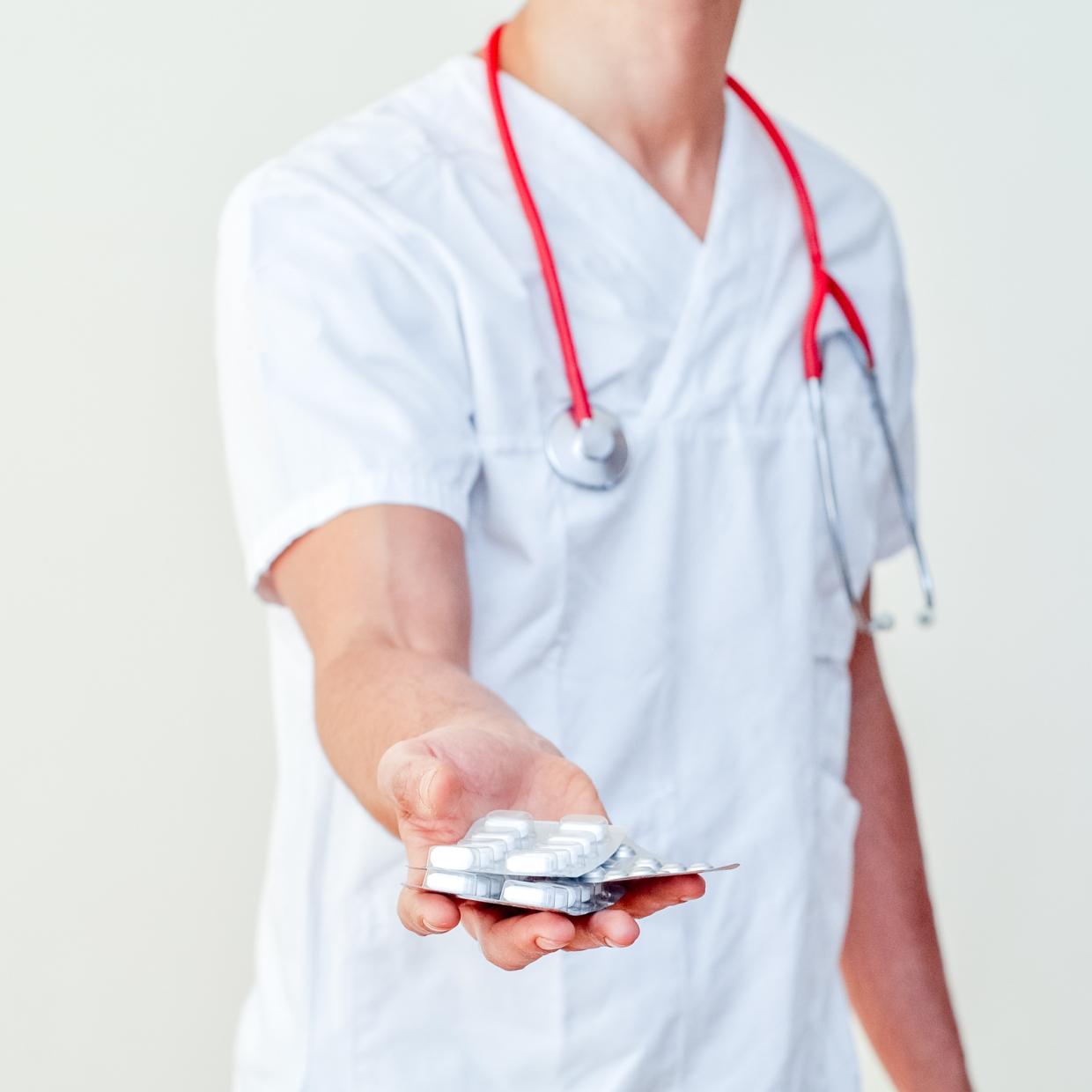 Doctor Handing Out Meds